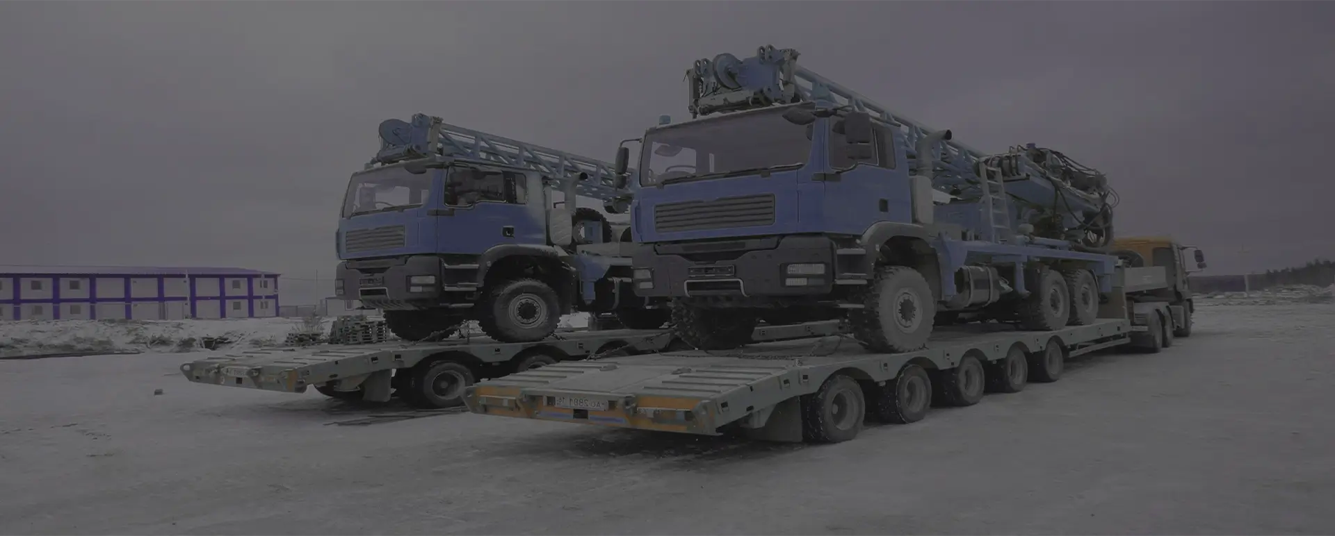 Доставка тралом с низкорамной платформой автокранапо России из Русской Поляны, а также любой другой крупногабаритной техники
